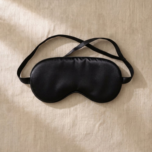 Black satin sleep eye mask — free gift from Somnei
